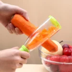 Vegetable Peeler With Storage Tube - Image 3